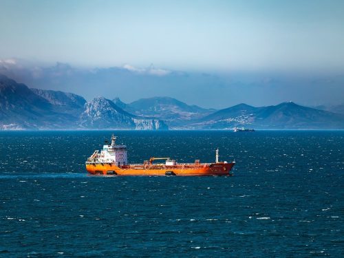 Large cargo ship representing Strait of Hormuz shipping risks